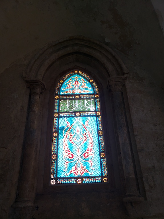 Stained glass window at the place where the Last Supper was believed to have occurred in Jerusalem.