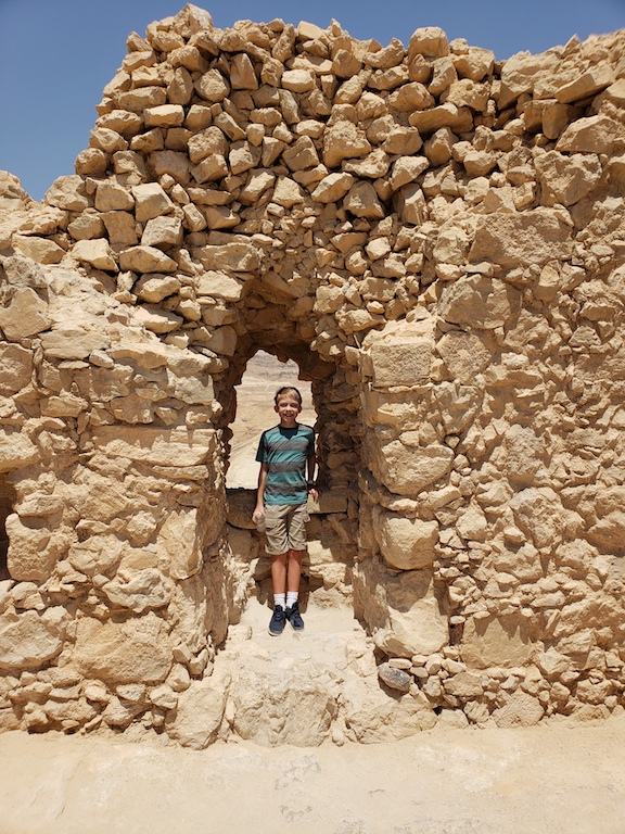 Exploring the Masada fortress ruins in Israel.