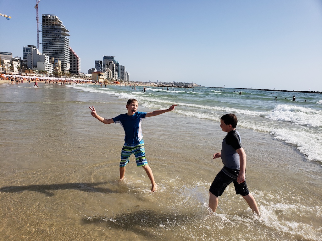 Playing at the beach in Tel Aviv, Israel.