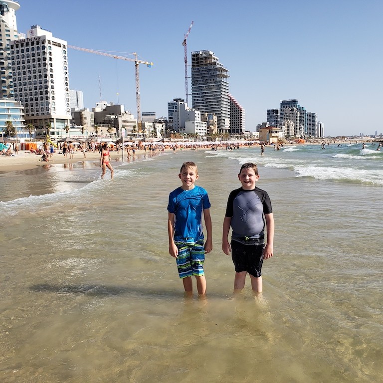 Playing at the beach in Tel Aviv, Israel.