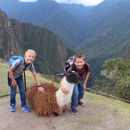 Petting the llamas at Machu Picchu in Peru.