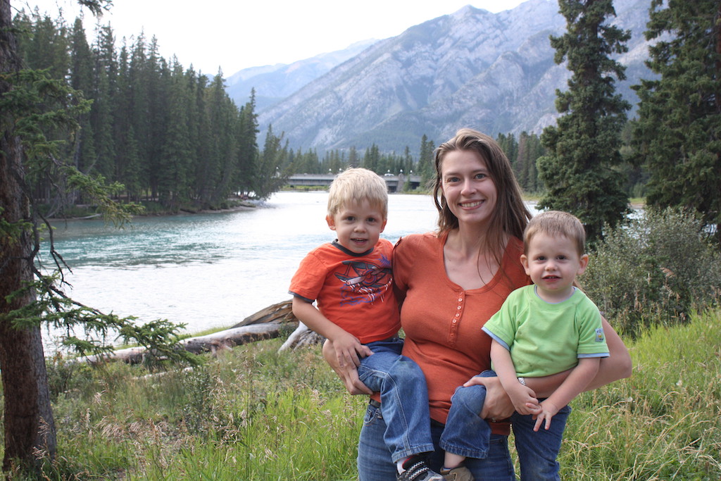 Mom and two children hiking in Banff National Park in Canada.