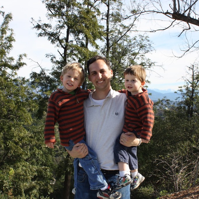Dad and sons on a hike.