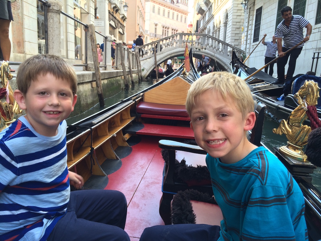Riding a gondola in Venice, Italy.