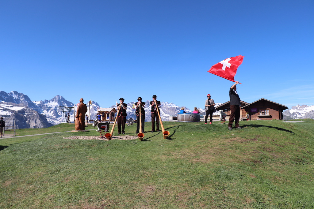 Musicians playing in the Swiss Alps in the Jungfrau Region of Switzerland