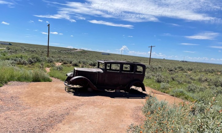 A 1932 Studebaker parked along old Route 66 in the Petrified Forest National Park