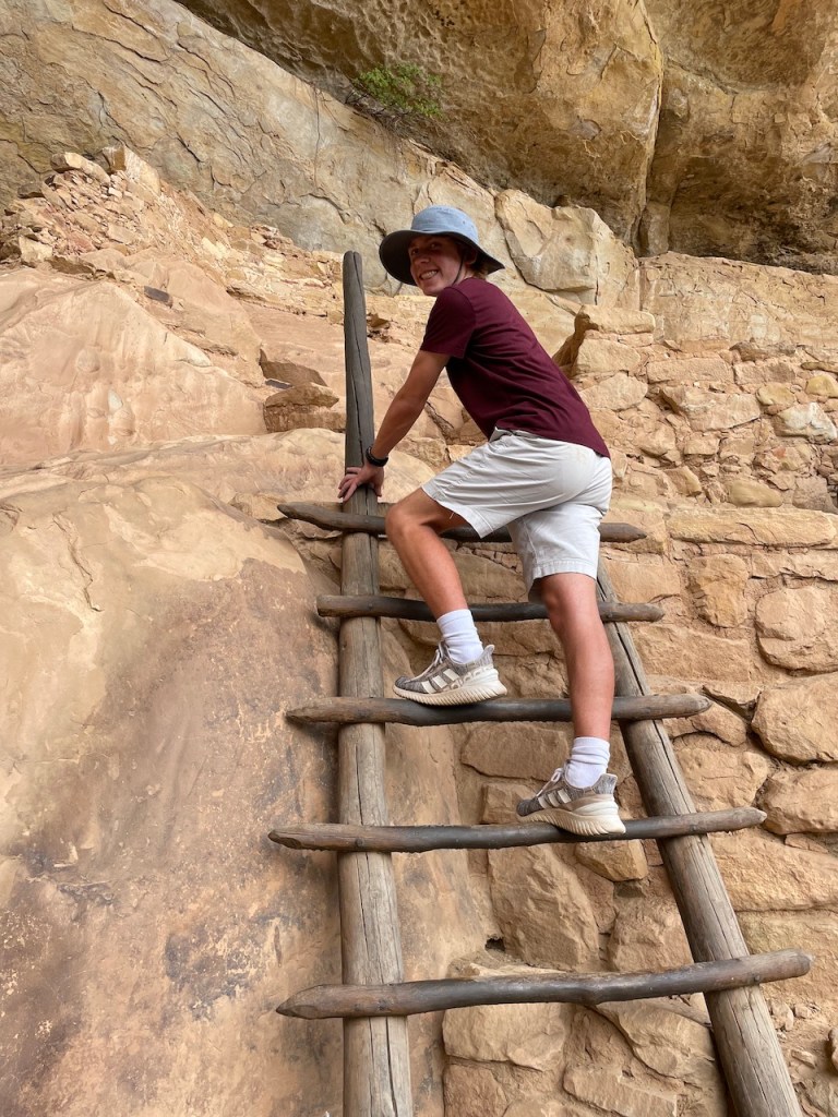 Climbing a Ladder at the Cliff Dwellings in Mesa Verde National Park
