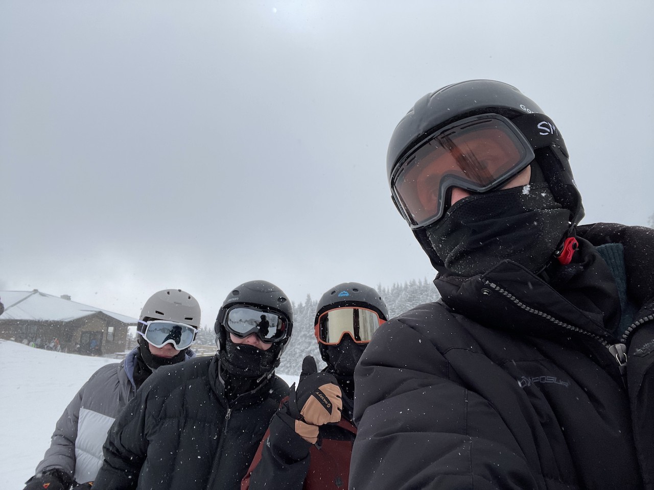 A family enjoying a day of skiing at Okemo Mountain Resort in Vermont.